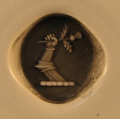 wax impression from crest engraved signet ring